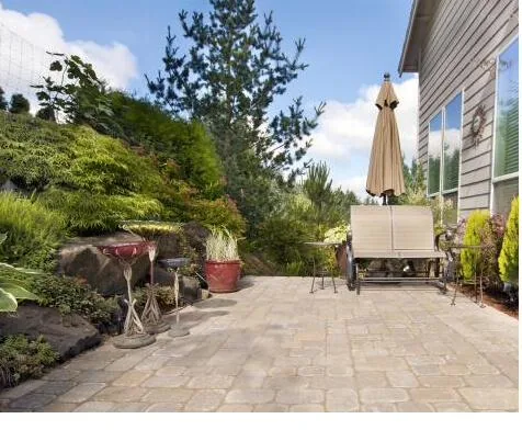 Clean, clear paved courtyard after rubbish removal